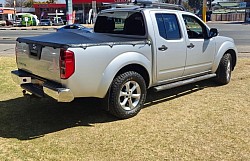 2012 Nissan Navara 2.5 DCi LE 4x4 A/T 265 100Km Silver, Black Trim, Aircon, Power Steering, Electric Windows, Radio /CD, Bluetooth Connectivity, Multi Function Steering Wheel, Cruise Control, Safety Tint, Side Steps, Towbar, Rubberised, Tonneau Cover  R219 950